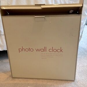 Photo wall clock NEVER used or ever taken out of its original packaging!